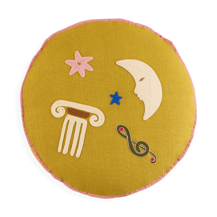 Round yellow fabric patch with celestial designs on a white background