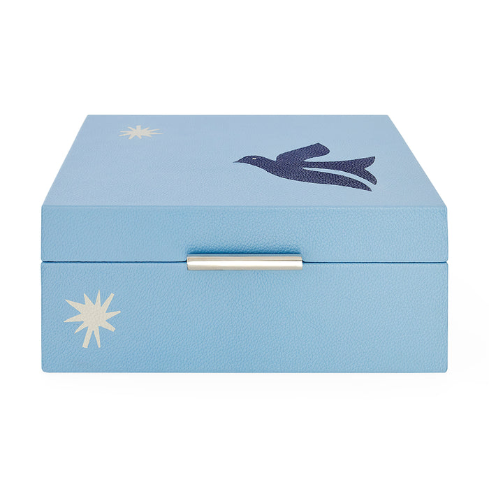 Light blue jewelry box with bird and star designs on a white background