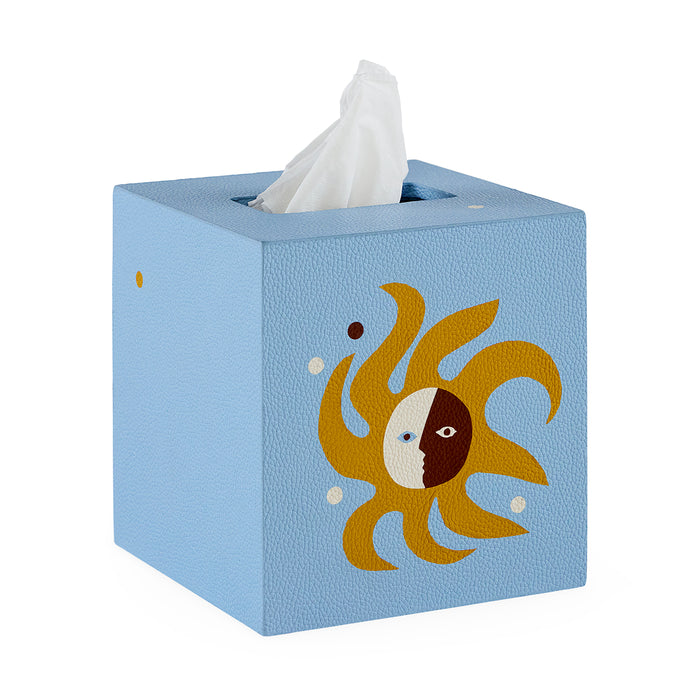 Blue tissue box cover with sun design on a white background