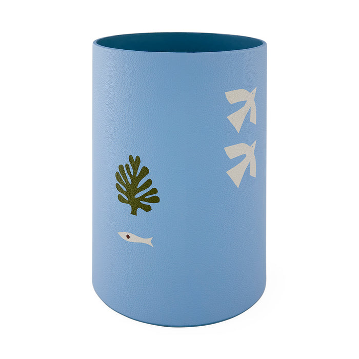 Blue cylindrical container with green leaf and white bird designs on a white background