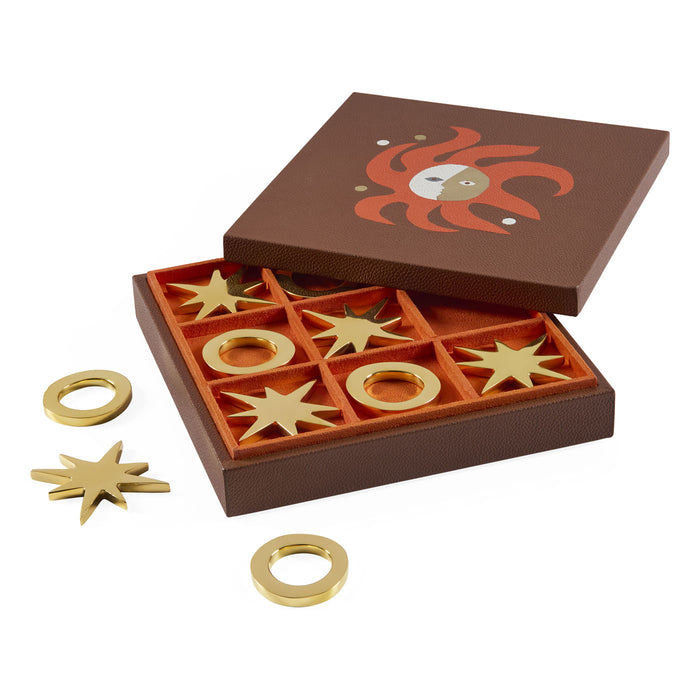 Wooden game set with gold pieces and decorative box on a white background