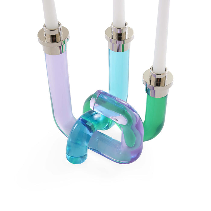Colorful U-shaped candle holder with three candles on a white background