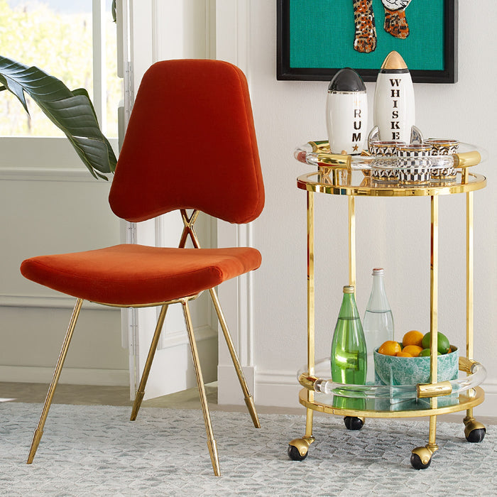 rocket decanter rum and whisky jacques round bar cart maxime dining chair - styled view