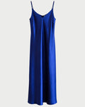 A royal blue satin slip dress with thin spaghetti straps and a V-neckline, shown against a plain white background.