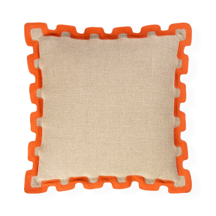 A square throw pillow with a textured beige linen-like center and a bright orange interlocking puzzle-style border, shown on a plain white background.