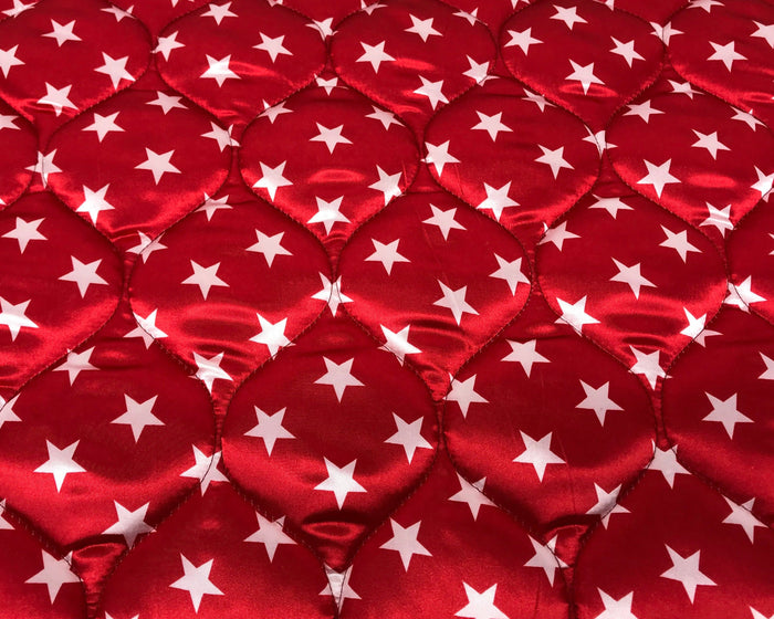 Red satin dog bed with star print from Fms Dog Beds, designed as a comfortable coat saver for pets.