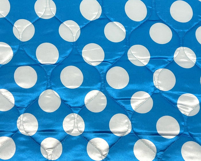 Blue and white polka dot satin coat saver dog bed by Fms Dog Beds with a soft, comfortable fabric for pets.