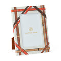 Jonathan Adler leather-strap patterned picture frame with a light blue insert, shown on a clean white background.