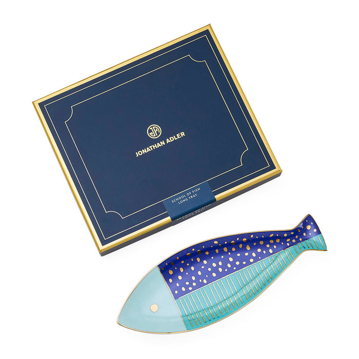 Decorative fish-shaped tray with Jonathan Adler packaging on a white background