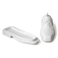 White ceramic shoe and slippers on a white background