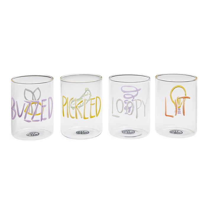 Four clear drinking glasses lined up in a row on a white background, each with a different colorful hand-drawn style graphic and word: a butterfly and 'BUZZED', a pickle and 'PICKLED', a halo and 'LOOPY', and a lightbulb and 'LIFT'.