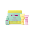 BYOMA So Clear Set featuring a yellow case, accompanied by a Clarifying serum, Creamy Jelly Cleanser and Moisturizing Gel Cream.