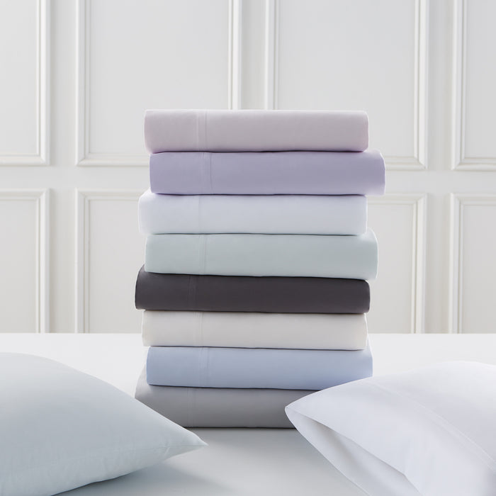 sateen sheet set stacked - styled view
