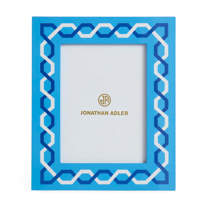 Blue decorative photo frame with Jonathan Adler logo on a white background