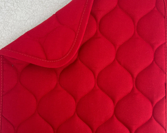 Red canvas dog bed from fmsdogbeds, designed for RuffLand™ Performance Kennels, providing a comfortable resting spot for dogs.