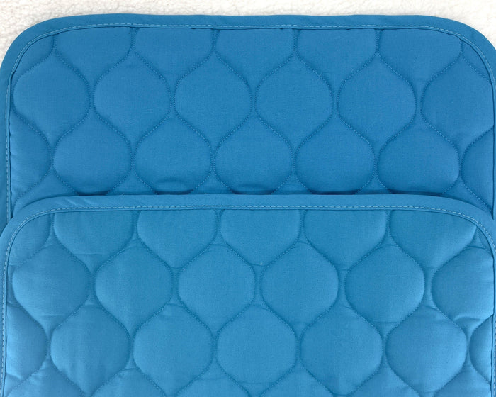 Teal canvas dog bed by fmsdogbeds, designed for RuffLand™ Performance Kennels, with a soft, durable surface for pets.