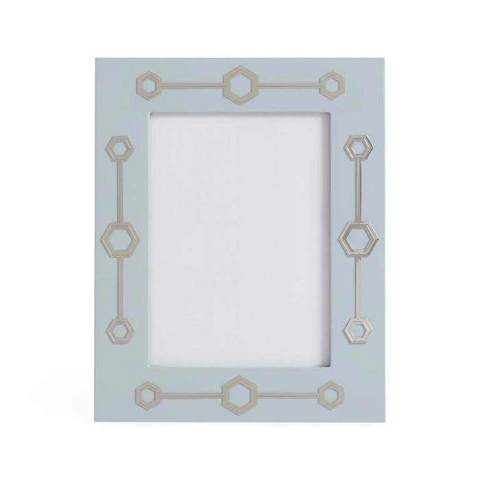 Decorative picture frame with geometric patterns on a white background