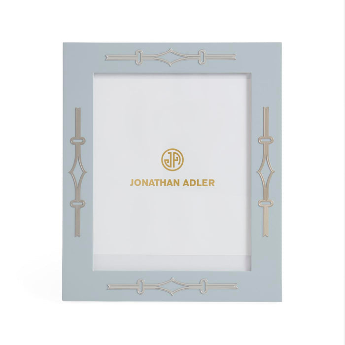 Decorative photo frame with 'Jonathan Adler' branding on a white background