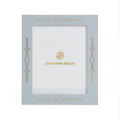 Decorative photo frame with 'Jonathan Adler' branding on a white background