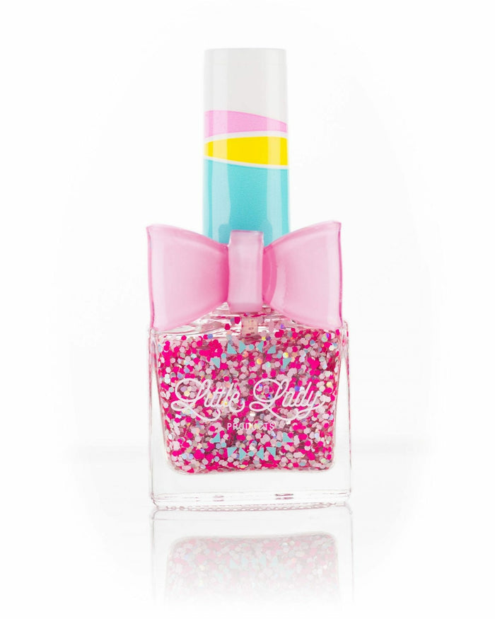 Unicorn Wishes nail polish with pink sparkles and a bow, designed for kids, offering a sweet scent and magical manicure experience.