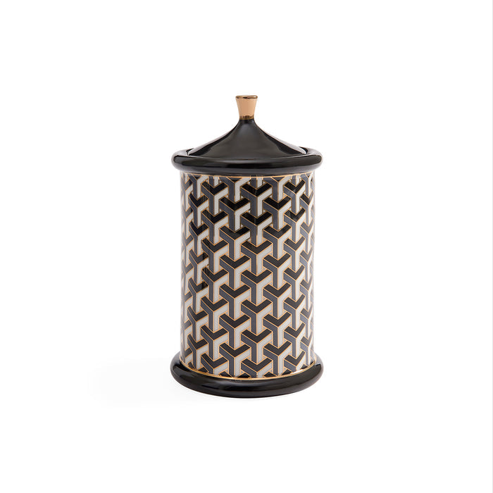 A cylindrical lidded storage jar with a black and beige geometric pattern, featuring a black lid with a small beige knob, set against a plain white background.