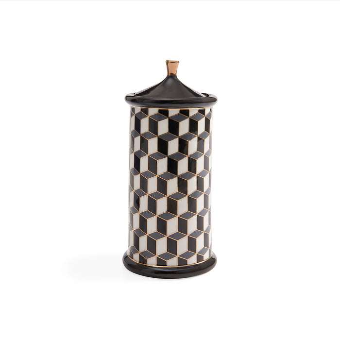 A cylindrical lidded container with a black and white 3D geometric cube pattern and a small gold-toned top knob, shown on a plain white background.
