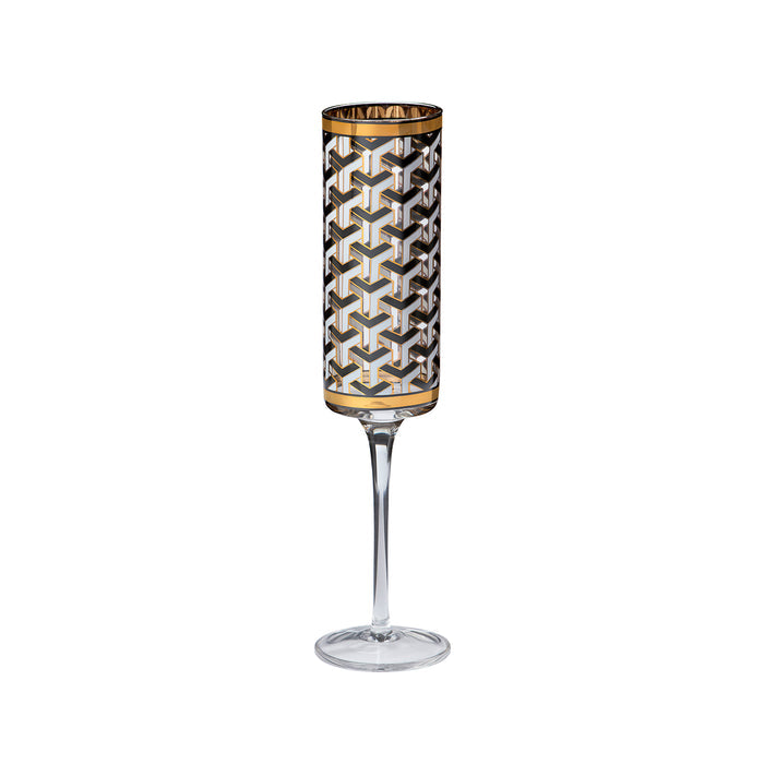A clear stemmed glass featuring a cylindrical patterned body with a black, white, and gray geometric cube design and gold trim at the top and bottom, shown on a plain white background.