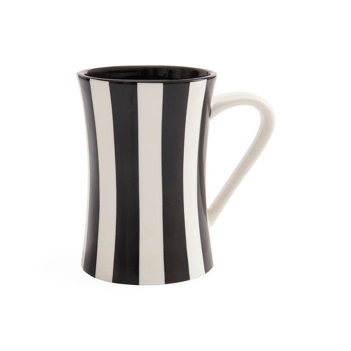 A ceramic mug with a bold black and white vertical stripe pattern, featuring a curved handle and a flared rim, shown on a plain white background.