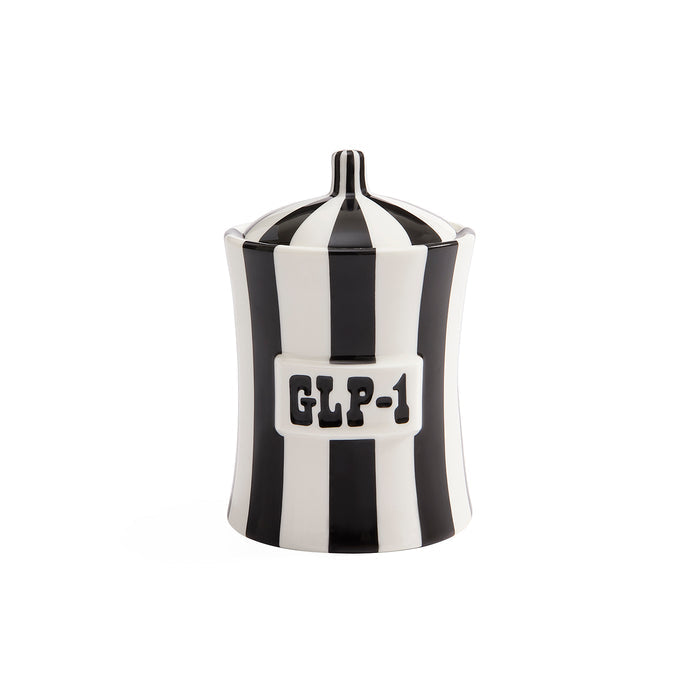 A black and white striped ceramic jar with a lid, featuring a white label on the front with the text 'GLP-1' in black.