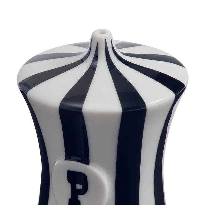 A close-up of a glossy ceramic bottle or vase with a white body, dark navy blue vertical stripes, and a large embossed letter 'P' on the front, set against a plain white background.
