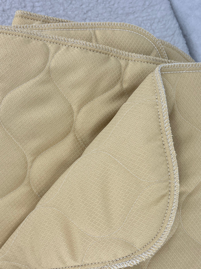 Fms Dog Beds water absorbent just-in-case pads inside a soft dog bed for comfort and moisture control.